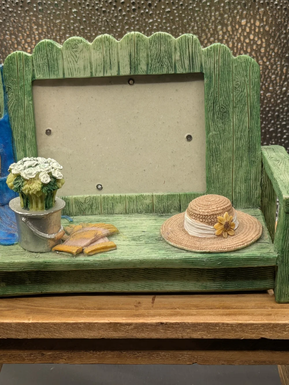 Green Wooden Bench Picture Frame with Hat and Potted Flowers